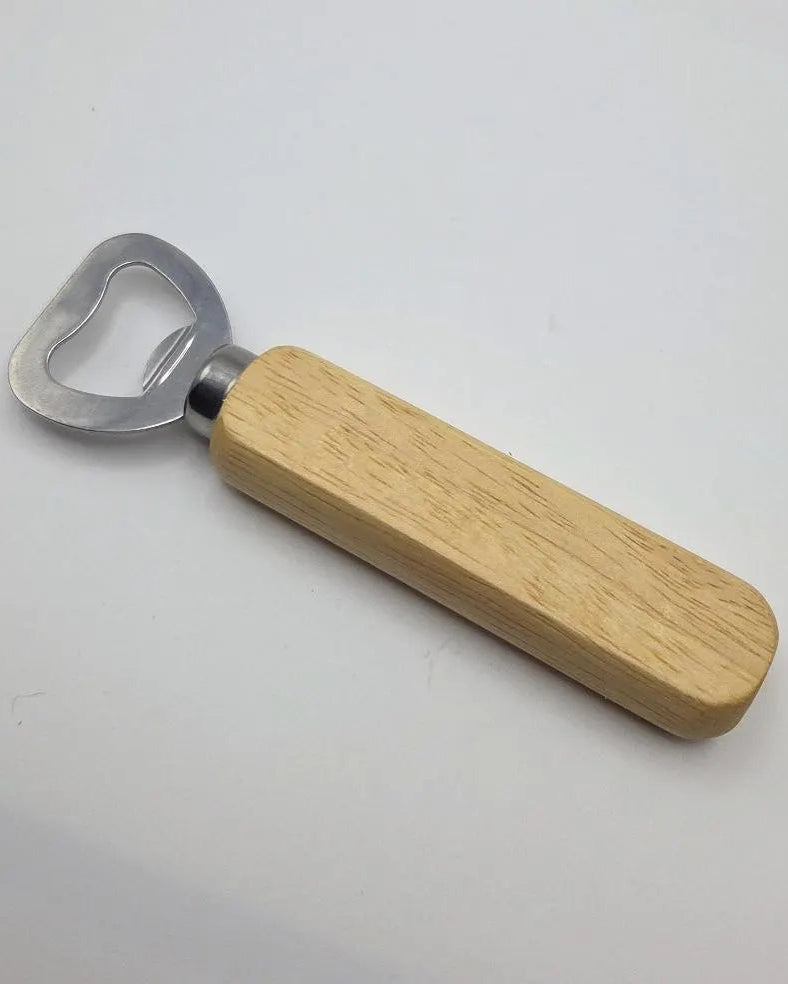 A bottle opener with a light natural wood handle and a silver metal heart-shaped pull tab, shown on a plain light background.